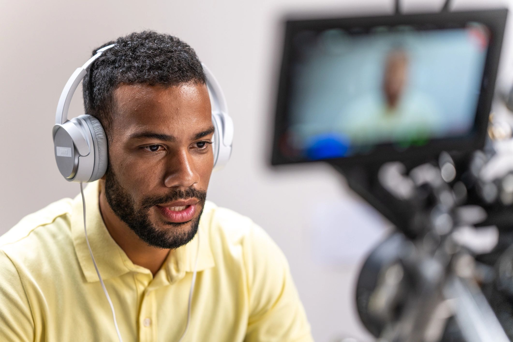 Person speaking on camera for online streaming