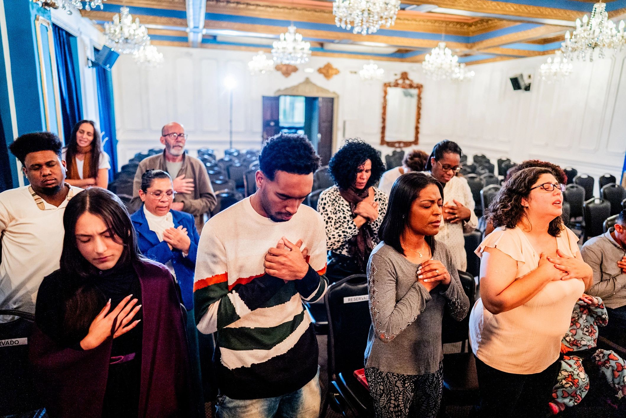 People praying together in church